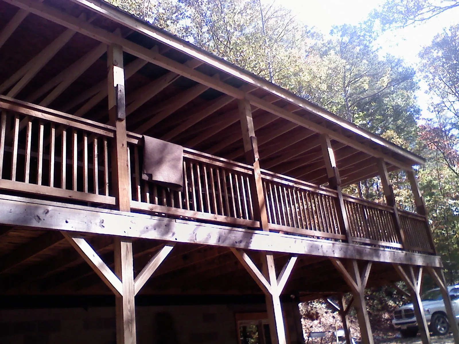 Timber framing under a new elevated porch and deck — Roof Leak Repair in Porterville by Roofing Brothers